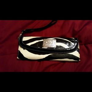 Zebra print wristlet (never used).