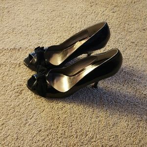 Black peep toe pumps