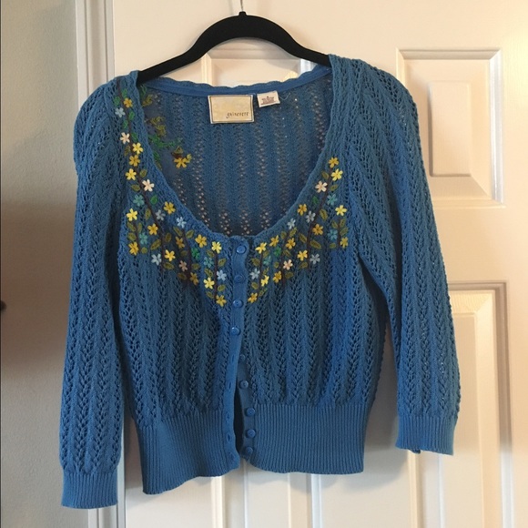 Cropped button up sweater.