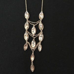 Long gold ladder style necklace