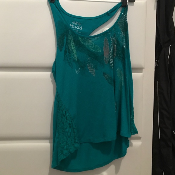 Turquoise crop top with lace on the sides