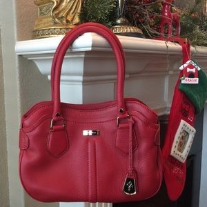 New Cole Haan Red Leather Purse never used.