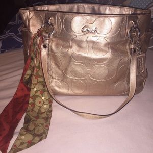 Coach gold leather purse