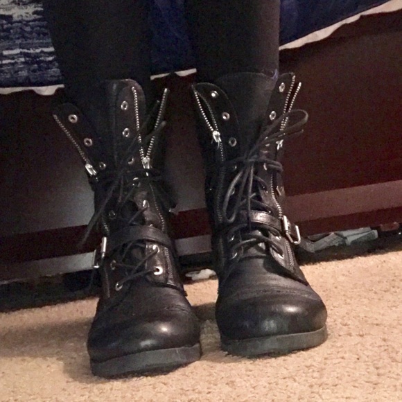 Trendy black leather combat boots