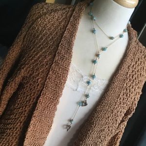 Long variable length beaded necklace