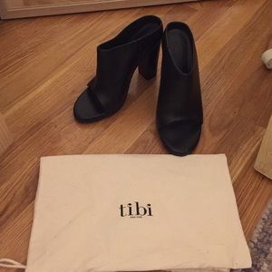 Tibi Leona mules in black