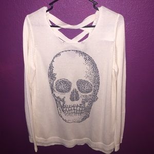 Skull sweater with ribbon back