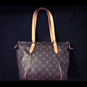 SOLD***Louis Vuitton shoulder bag. NOT authentic