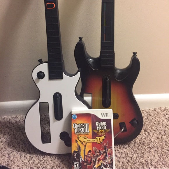 Wii guitar hero game and guitar controllers.