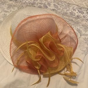 White Derby hat with yellow and orange ribbons