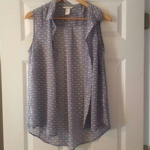 Sleeveless, button down shirt