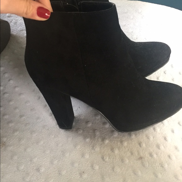 Heeled black booties