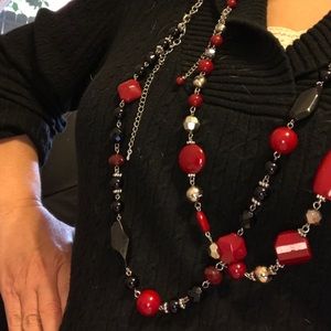 Two long necklaces. Can wear together or separate.