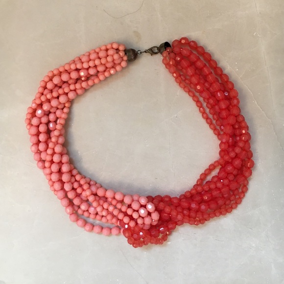 Coral colored beaded necklace