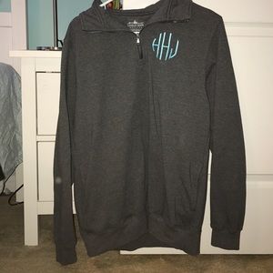 grey monogrammed jacket