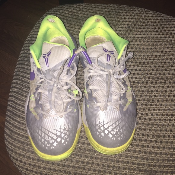 kobes shoes black and white