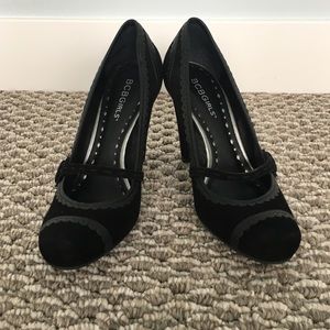 Used. Worn twice black suede BCBGirls black pumps.