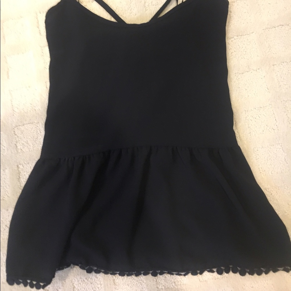 Black top with detailed bottom and crossed back