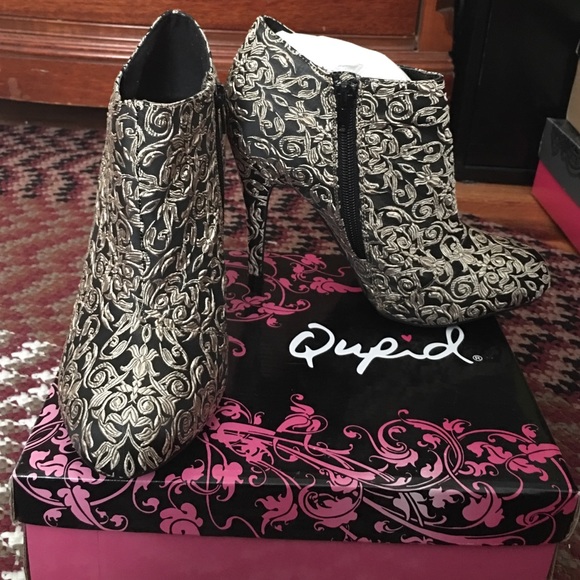 Black and gold ankle boots