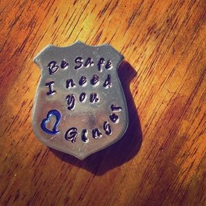 Engraved police emblem