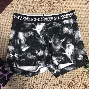 Under Armor compression shorts.