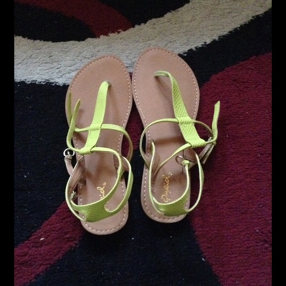 Neon green sandals.