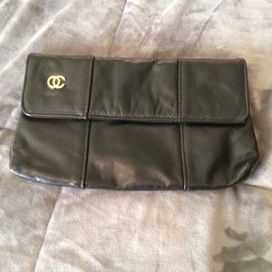 Vintage black genuine leather clutch.