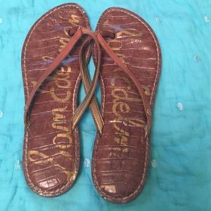 Brown flip flops
