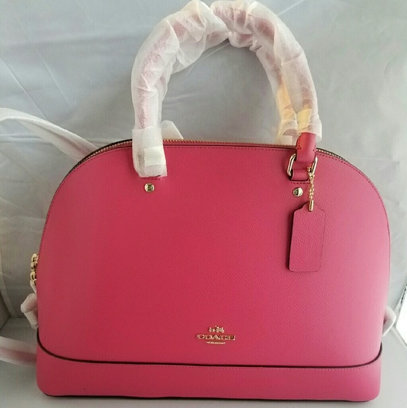 A wide assortment of NWT authentic Coach items. - Picture 5 of 6