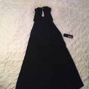 High neck, low cut, bow back,  black dress
