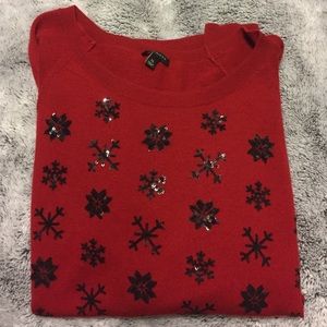 Red 3/4 length with black snowflakes. Like new