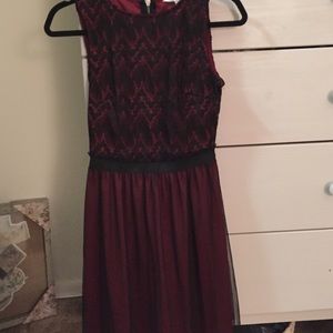 Burgundy dress with black overlay/ lace detail