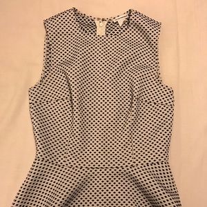 Club Monaco polka dot sleeveless peplum top.