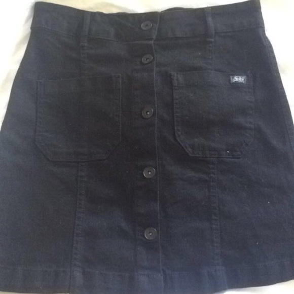 Small black denim skirt from a shop in London