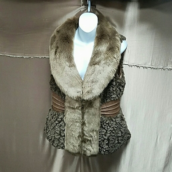 Brown faux fur vest.