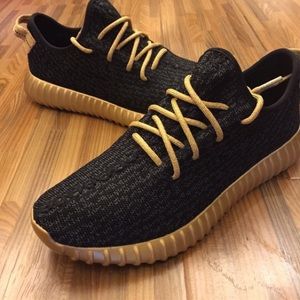 Gold and black custom yeezys