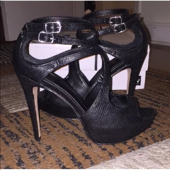 Black strapy heels: size 6.5