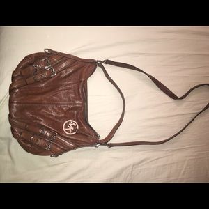 MK milo distressed satchel bag