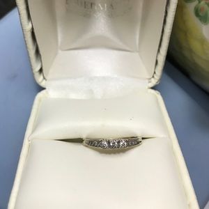 Three stone diamond ring.