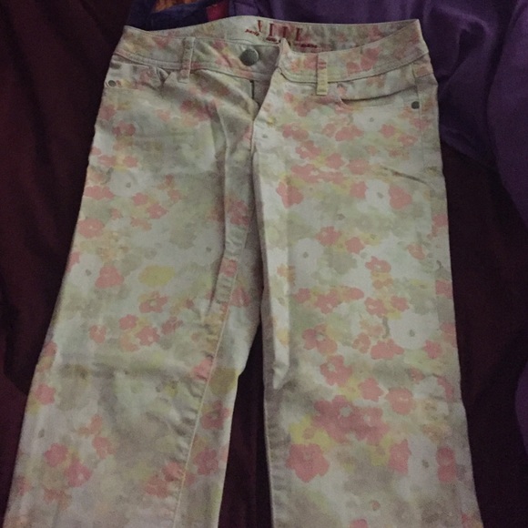 Light colored floral skinny jeans