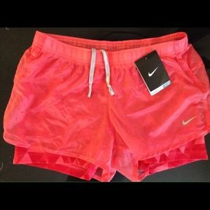 NEW Nike lined pink athletic running shorts Size S