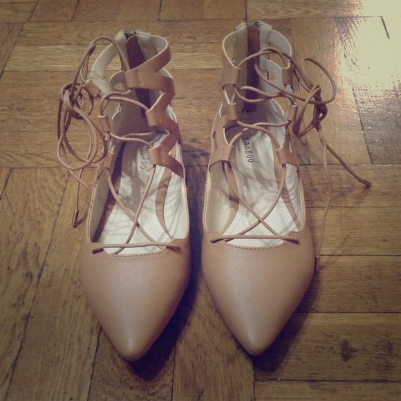 Nude lace-up flats