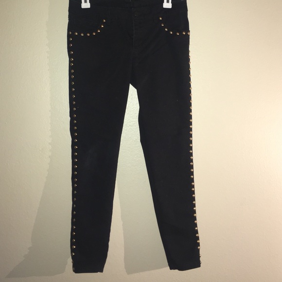 Black jeans with gold stud trim