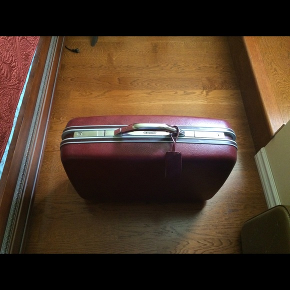 Vintage suitcase and garment bag