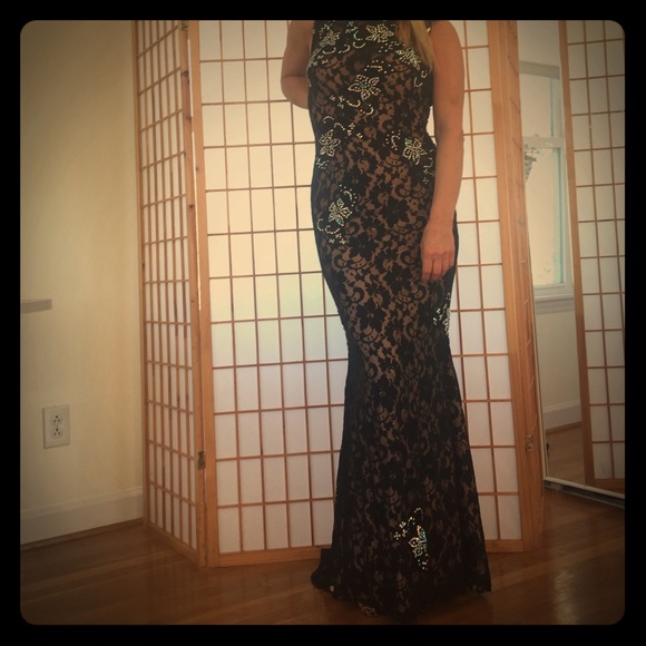 Another picture of black sequence dress with wear!