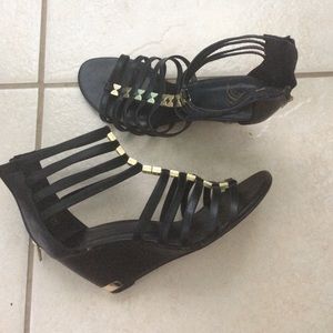 Black wedge heels with gold detailing