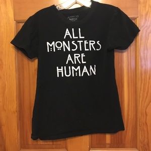 Black all monsters are human shirt