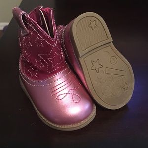 Adorable pink baby boots.
