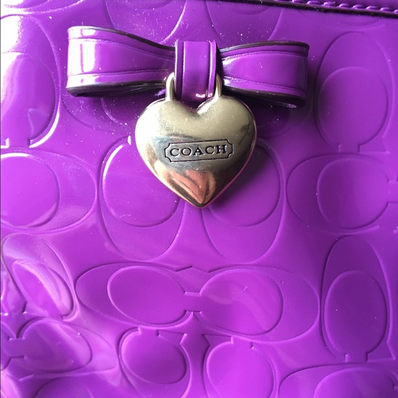 Coach clutch purple with classic coach pattern
