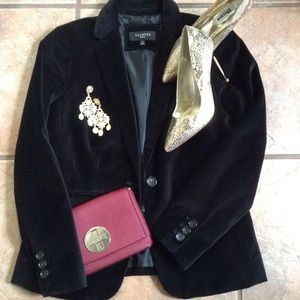 Luxurious black velvet smoking jacket